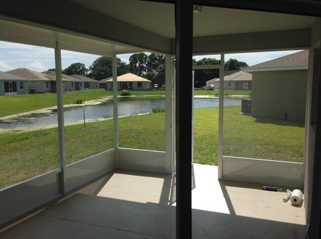 Building Photo - Well maintained 3/2/2 with pond view and community pool
