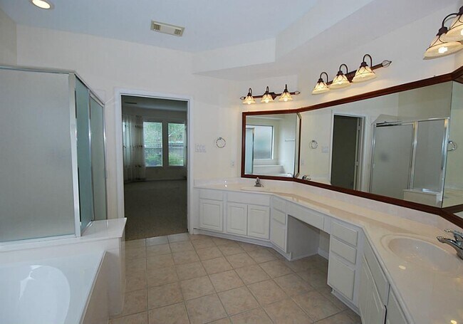 Building Photo - 9106 Memorial Pines Way