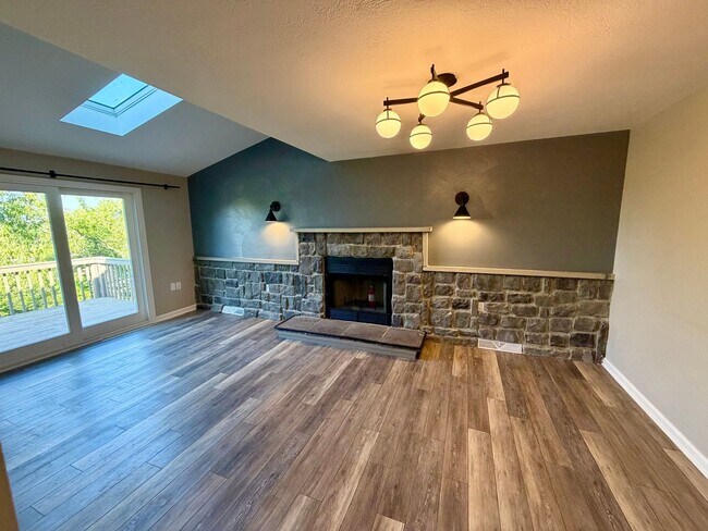 Building Photo - Modern Comforts Await: Spacious Rental with 2-Car Garage, Private Office, and Finished Basement w...