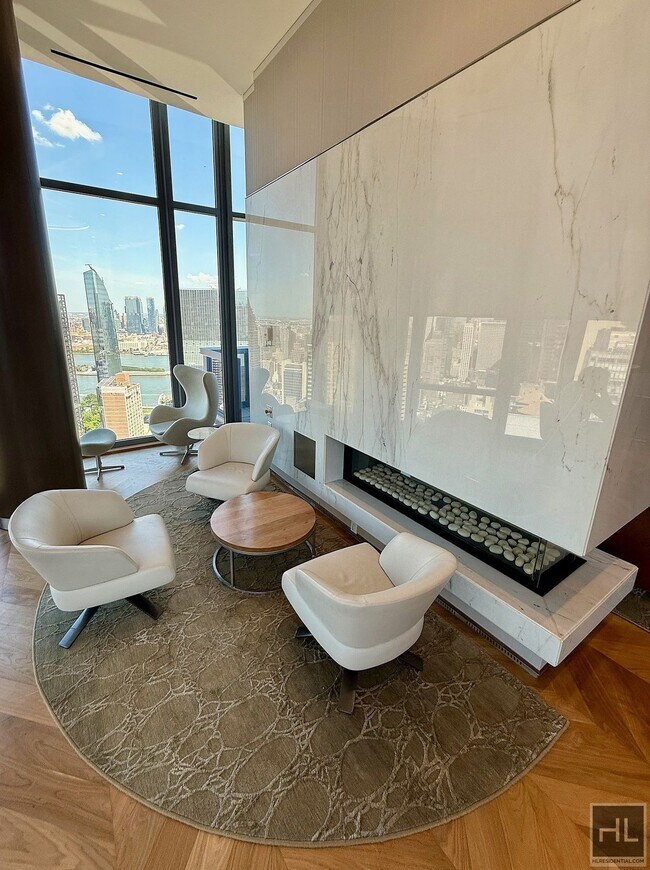 Building Photo - SUNNY NO FEE STUDIO IN THE LUXURY SUMMIT NYC