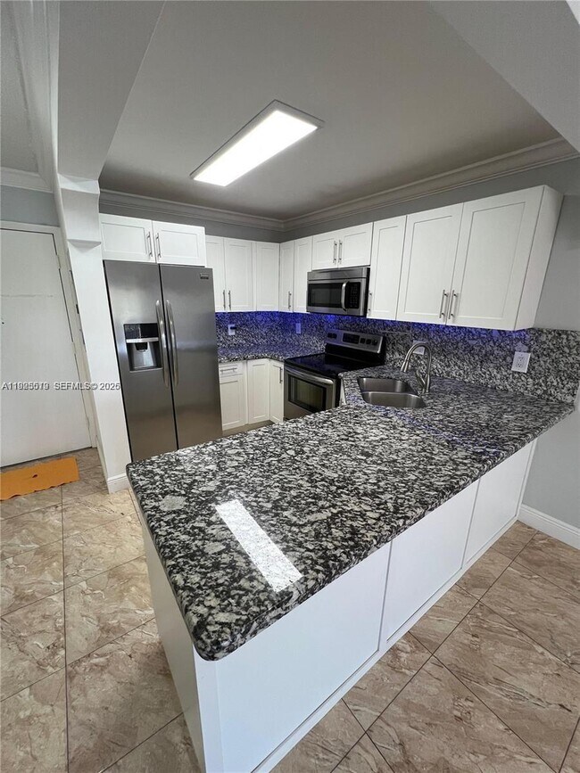 Building Photo - 1075 W 68th St