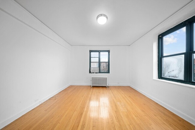 Building Photo - 34-40-40 79th St