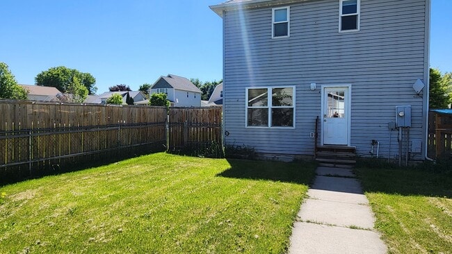 Building Photo - Beautiful House with Yard and Pets Considered