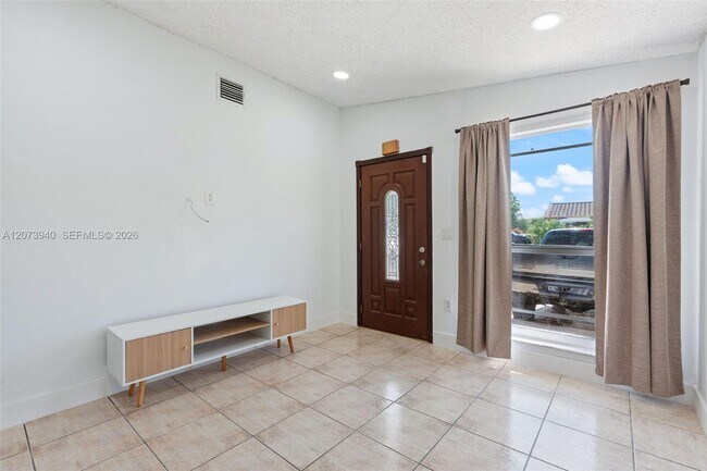 Building Photo - 11259 NW 88th Ave