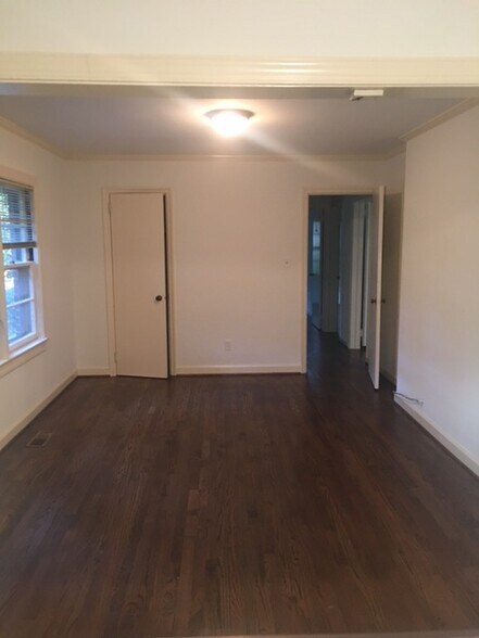 open floor plan, with solid beautiful flooring, and extensive crown molding being added. - 1206 Lafayette Ave