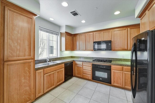 Building Photo - PRIME CORNER HOME NEAR TRAILS LIGHT-FILLED...