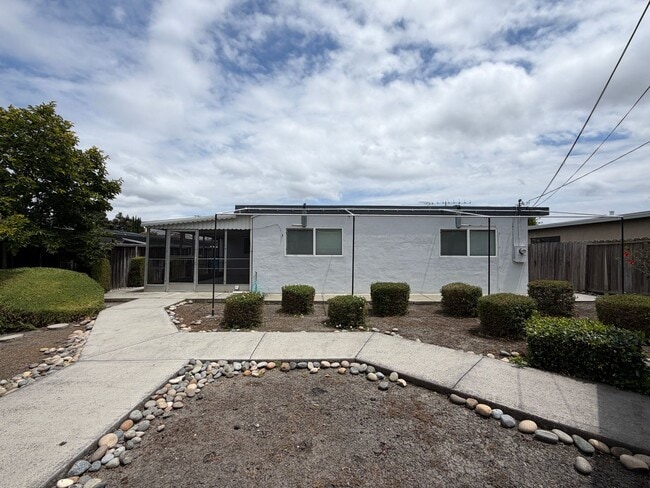 Building Photo - Bright, Updated Bungalow with 250 SF Bonus Sunroom