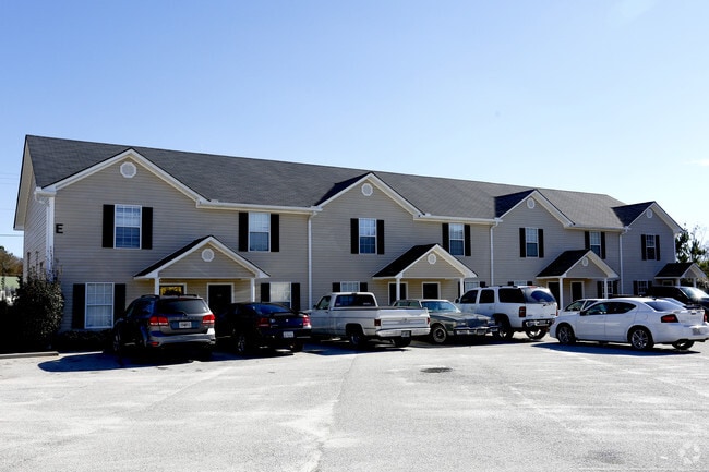 Building Photo - Carriage Townhouses