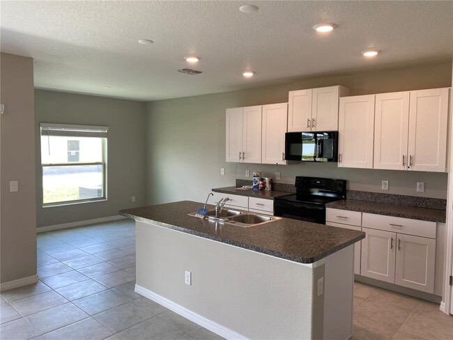 Building Photo - 7038 Samuel Ivy Dr