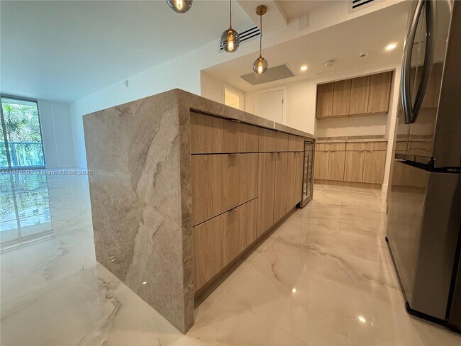 Building Photo - 19390 Collins Ave