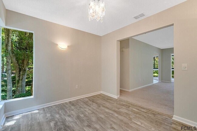 Building Photo - Stunning townhome on Palm Harbor Golf Course!