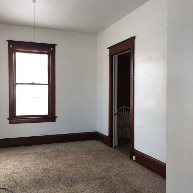 Building Photo - Corner lot with fenced yard!