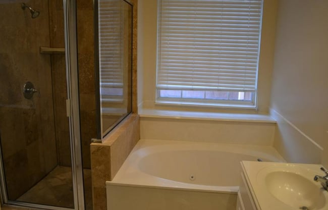 Primary Bathroom Shower and Jetted Tub - 18240 Midway Rd