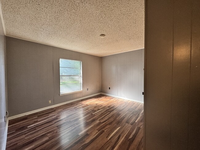 Building Photo - 203 E John Sims Pkwy