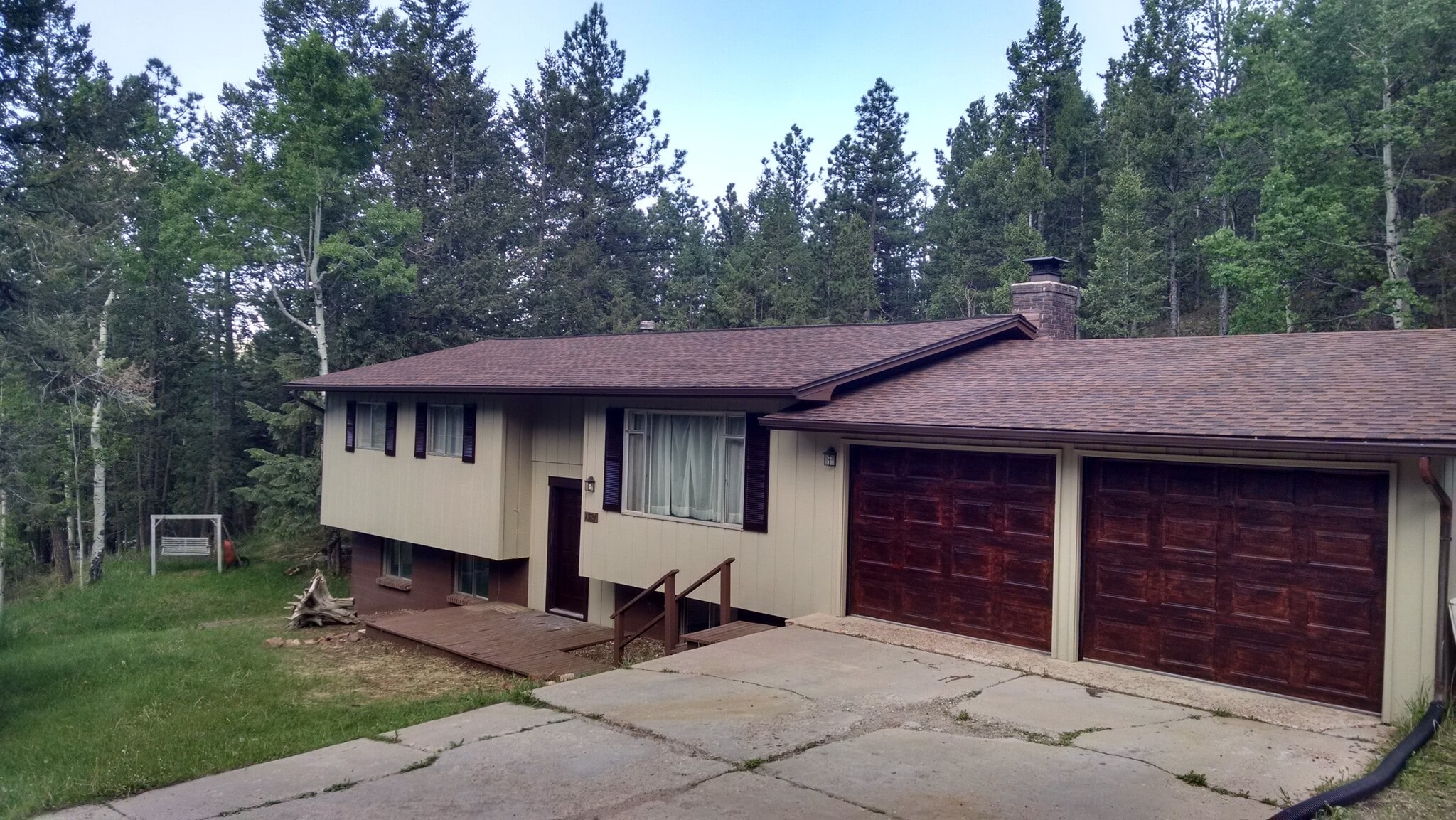 Front. Two car oversized garage with workshop. Flat driveway. - 1321 Browning Avenue