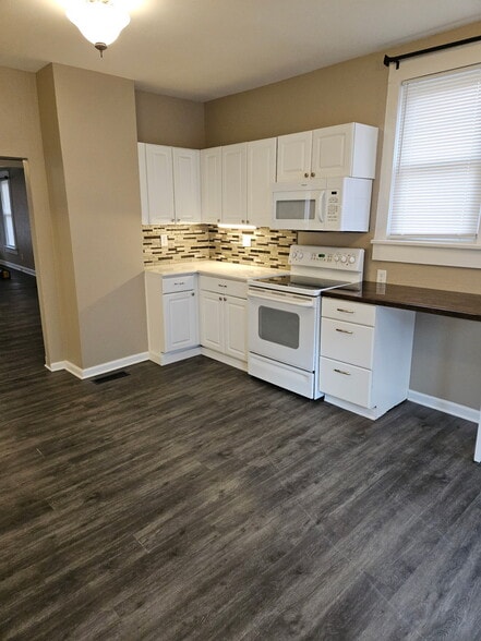 New tiled backsplash with under counter lighting - 1214 5th Ave