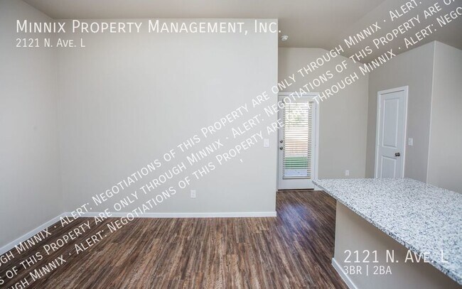 Building Photo - 2121 N. Ave L