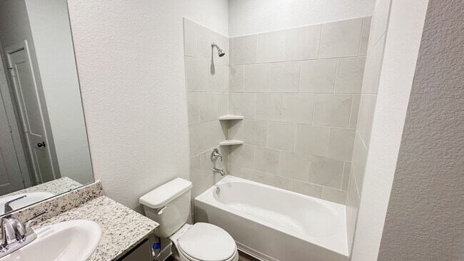 Building Photo - Brand new! Modern 3-Bedroom with Open-Conc...