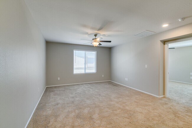 Building Photo - Spacious Townhouse with Loft & Rare 3-Car Garage!