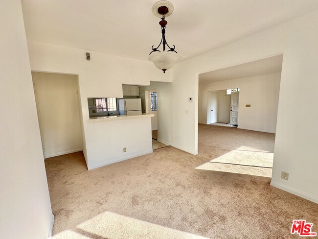 Building Photo - 6069 1/2 Cashio St