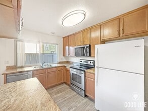 Building Photo - Charming 2-Bed/2-Bath Condo in Gated Forest Glen Community