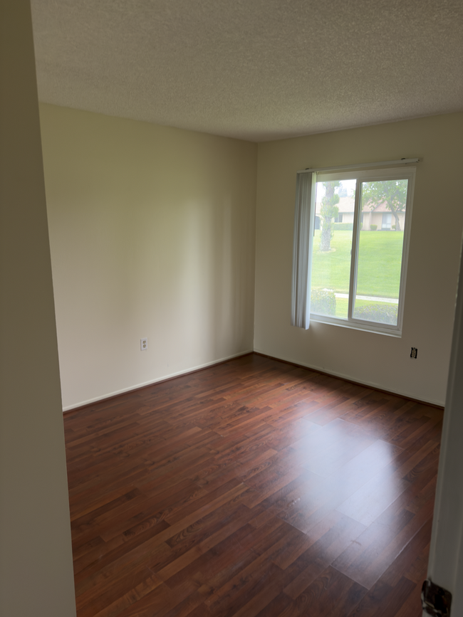 Building Photo - Nicest Unit at Plaza West..with grounds li...