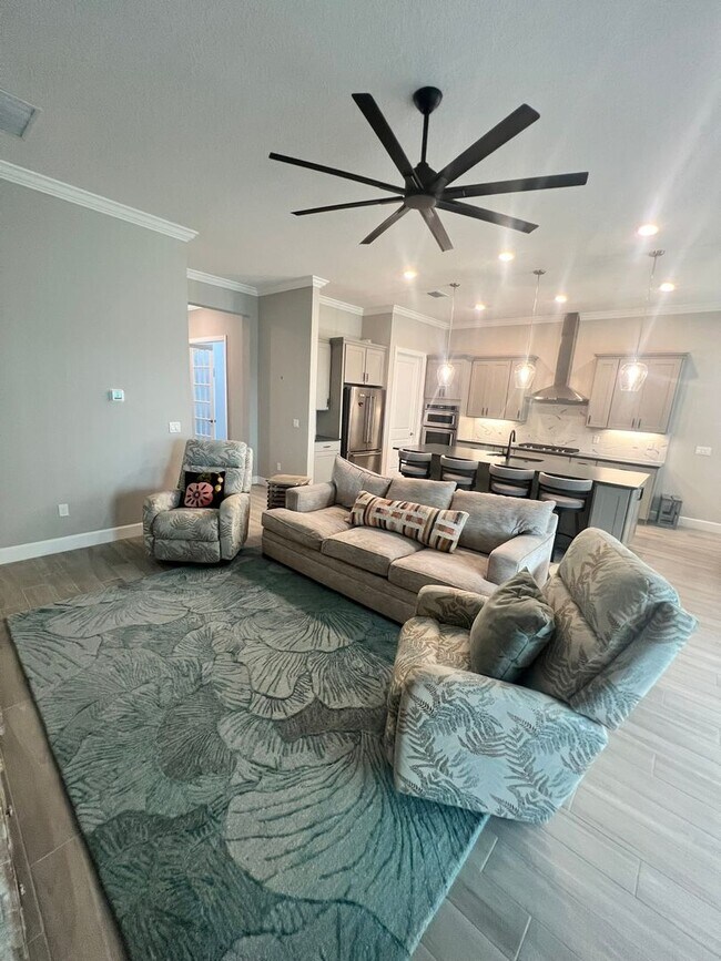 Building Photo - STUNNING LAKEFRONT 3 BEDROOM, 2.5 BATH HOM...