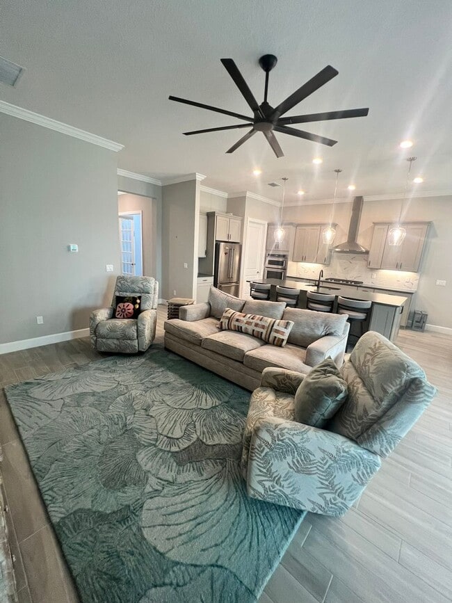 Building Photo - STUNNING LAKEFRONT 3 BEDROOM, 2.5 BATH HOM...