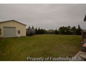Building Photo - HUGE DETACHED GARAGE with 12' Door! 3 Bed/...