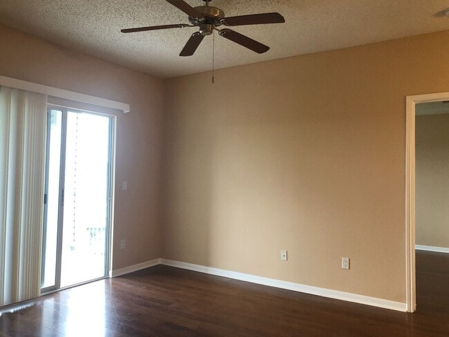 Building Photo - WATER VIEW! 2X2- Spacious 3rd floor condo with tranquil water views from balcony!! Gated Regency ...
