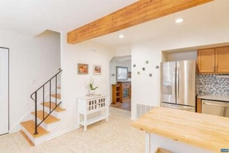 Building Photo - 3BR End-Unit Townhome with Outdoor Oasis –...