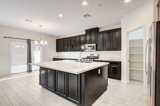 Building Photo - 4 Bedroom Townhouse in Tule Springs Coming Soon!