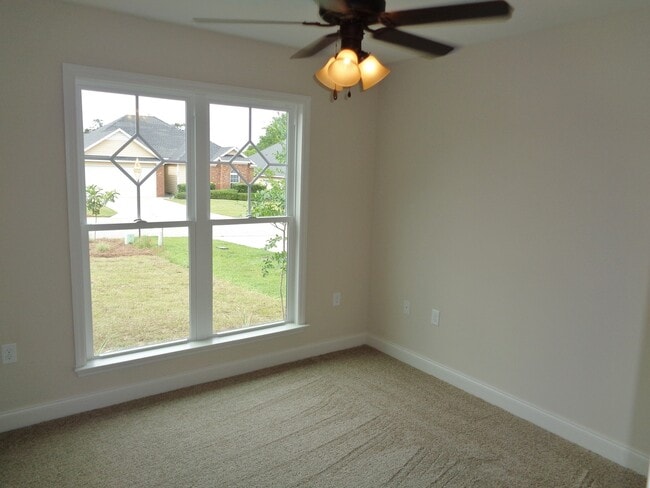 Building Photo - Spacious 4BR Home with Open Split Floor Plan, Granite Kitchen & Fenced Yard