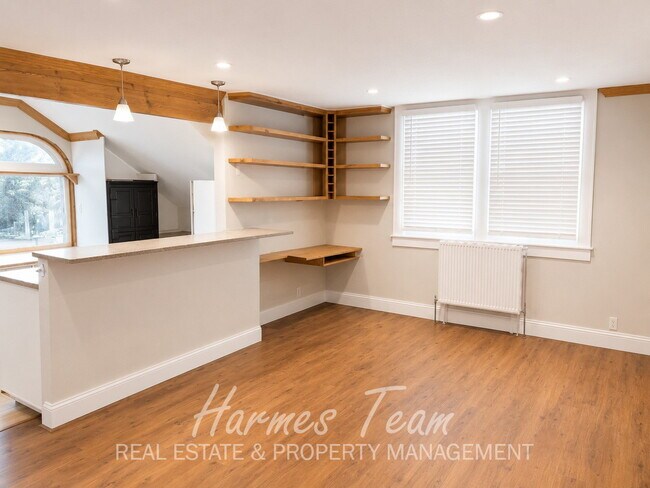 Building Photo - Upper-Level One-of-a-Kind 2 Bedroom 1 Bathroom Apartment