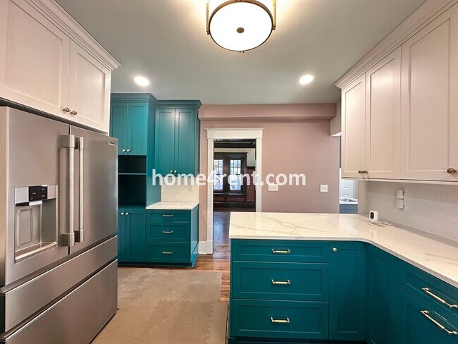 Building Photo - Beautiful, KCMO Home with Historic Charm, Updated Kitchen, Wood Floors and a Fenced Yard!