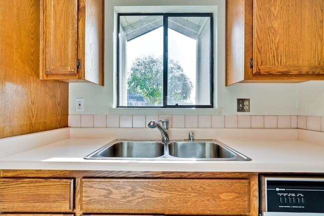 Building Photo - New Vinyl Plank Flooring, Fresh Interior Paint, 1 Car Garage + 1 Assigned Outdoor Parking Space -...