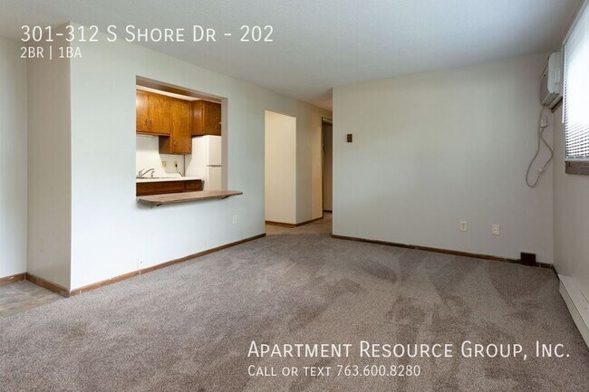 Building Photo - 301-312 S Shore Dr-202