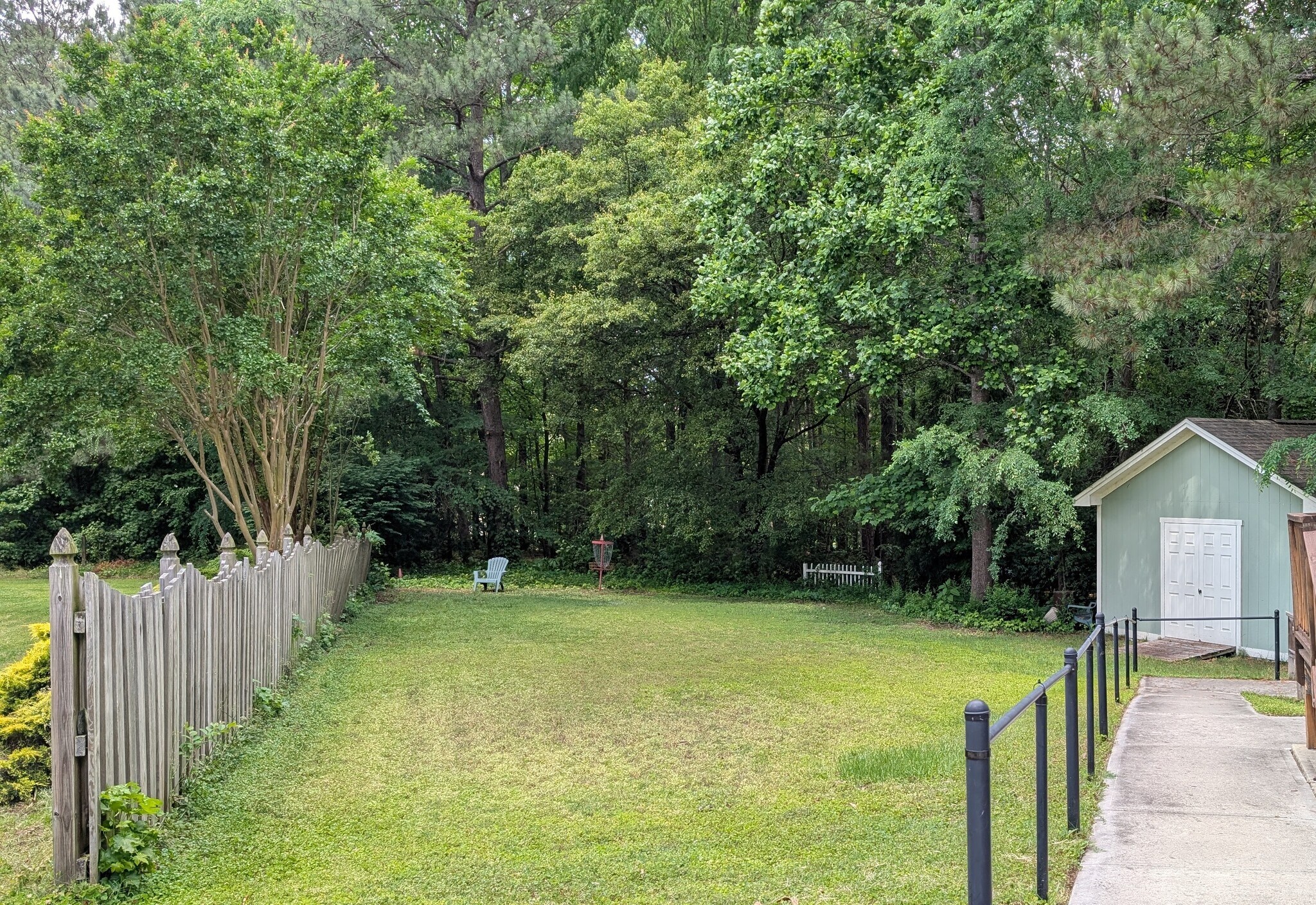 Side yard and path to rental - 8 Elam Ct
