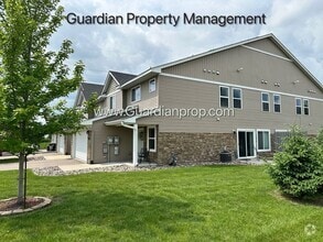 Building Photo - End Unit Town Home, Walk Out Patio, 2 Car ...
