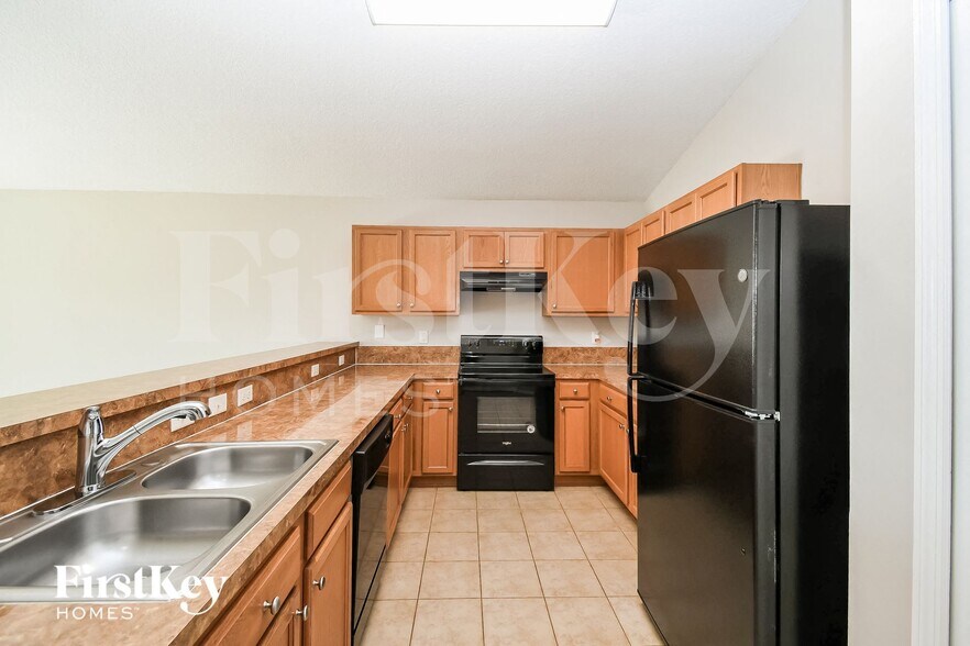 Building Photo - 7574 Mishkie Dr