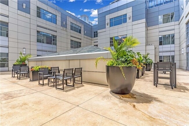 Building Photo - Luxury Penthouse Condo Downtown with Private Patio & Amazing Views Available Now!
