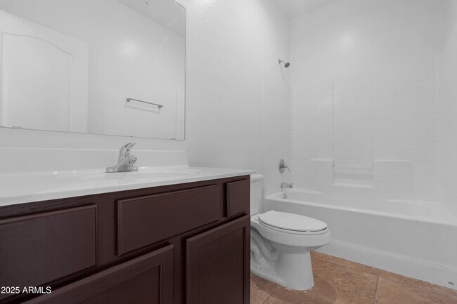 Building Photo - 8940 W Olive Ave