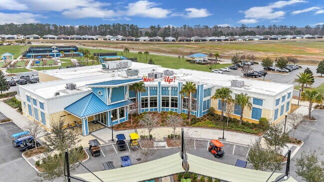 Building Photo - "Charming 2-Bedroom Retreat with 2 Baths and Den - 1558 Sq. Ft. of Comfort in Latitude Margaritav...