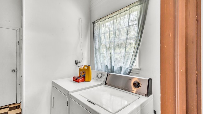 Laundry room and storage area - 1806 17th Ave