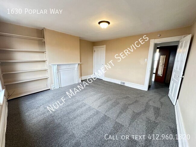 Building Photo - 1630 Poplar Ave