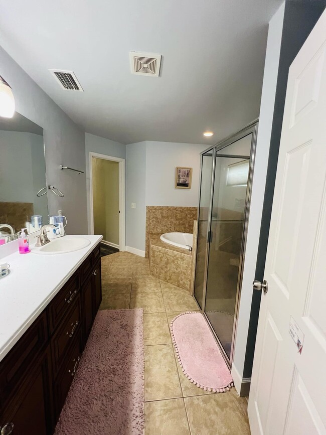 Specious bathroom attached with master bedroom, walk in shower with modern fixtures - 3602 NW 55th Ln