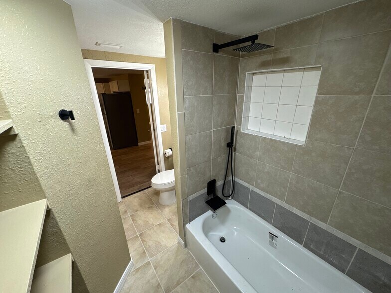 Spacious and new 2nd bathroom with plenty of shelves - 721 NW 22nd St