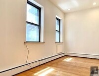 Building Photo - Beautiful Sunlit 1-Bedroom in the Heart of Midtown East