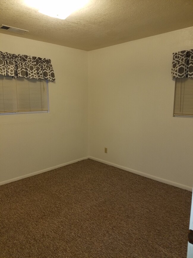 Building Photo - Spacious 2 Bedroom With Carport and Storag...