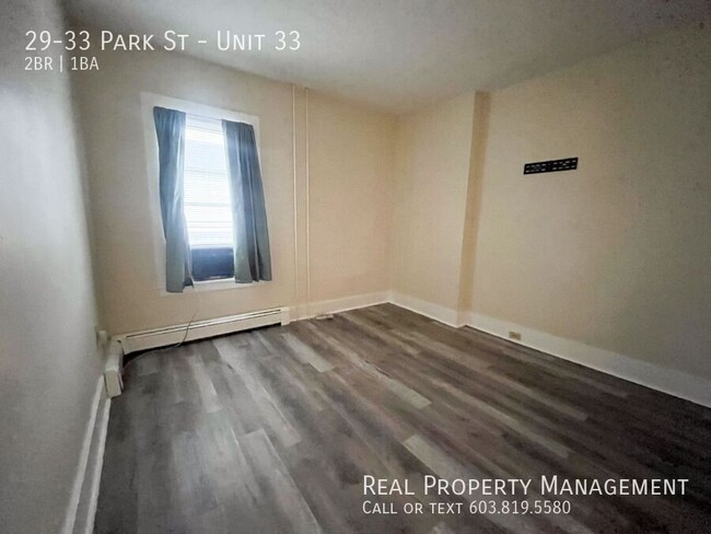 Building Photo - Pet-Friendly, Downtown 2-Bed with Heat and...